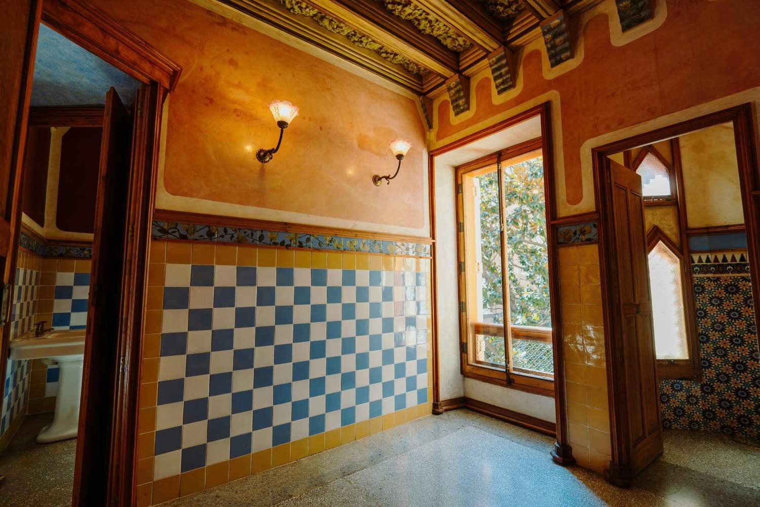 Decorated interior of Casa Vicens with painted walls and ornate ceiling