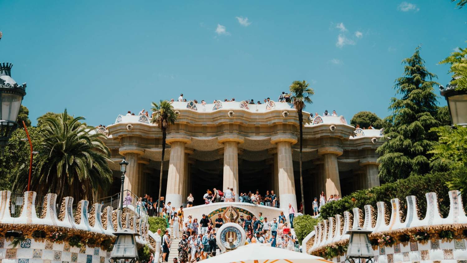 Mosaic serpentine bench and gatehouses at Park Güell